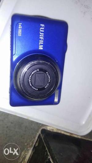 Blue Nikon Coolpix Point-and-shoot Camera