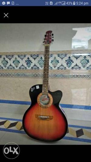 Brand new acostic guiter with bag & 1 year