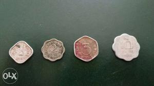 Four Indian Silver-colored Coins