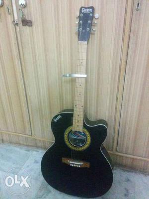 Givsan guitar.. in best condition with capo.