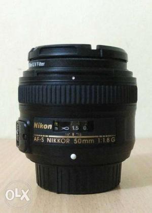 Nikkor 50mm 1.8g with UV filter and lense hood.