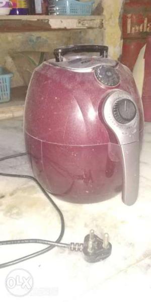 Red And Gray Canister Vacuum Cleaner