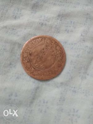 Round Brown And Silver Coin