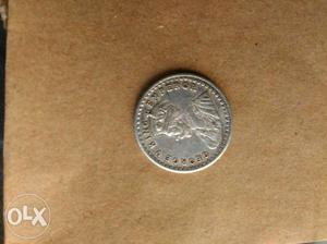 Round Silver-colored Coin