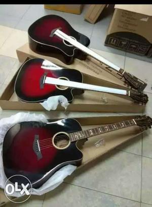 Three Sun Burst Cutaway Acoustic Guitars With Boxes