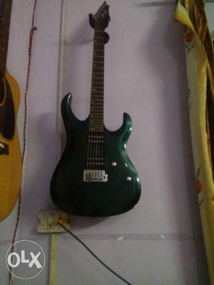 Black And Green Electric Guitar