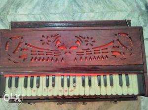Brown Wooden Framed Upright Piano