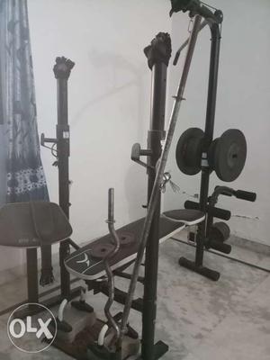 For sale home gym, bench, bars and weights