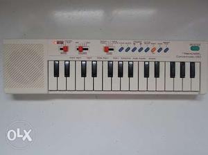 White And Black Electronic Keyboard