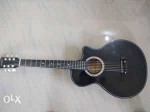 2 months old mike acoustic cut away guitar with