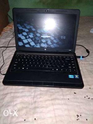 Black Laptop Computer With AC Adapter