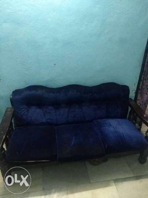 Black Wooden Framed Blue Padded Couch