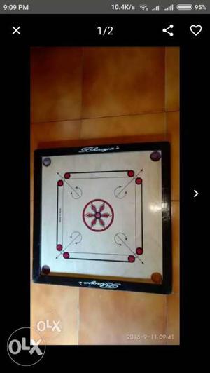 Brand new carrom board with coins. Excellent