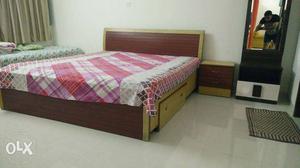Wooden bed along with side table, durable and