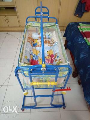 Baby's Blue And Yellow Bouncer