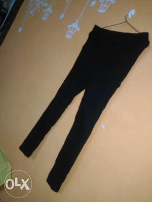 Black colour high waist pant with pockets. price