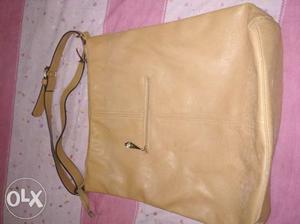 Brown color lady bag.