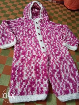 Crochet homemade baby romper for 0-3 months.