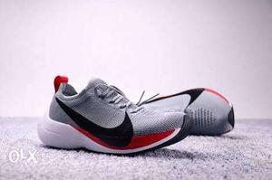 Gray-and-red Nike Running Shoes