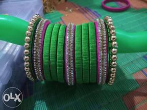 Green, Purple, And Pink Beaded Bracelets