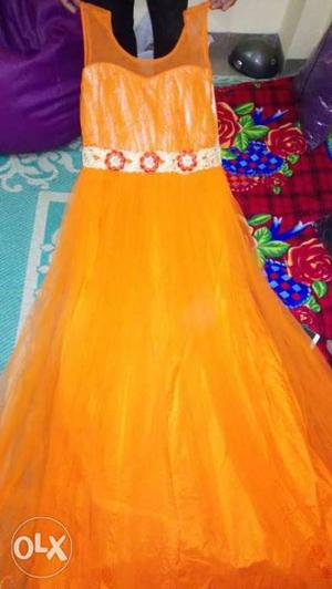 It's a orange bright color evening gown. Only one