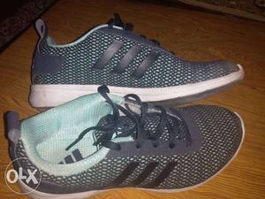 Pair Of Adidas Running Shoes