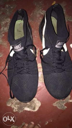 Pair Of Black Nike Low-top Sneakers