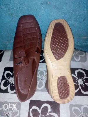 Pair Of Brown Leather Shoes