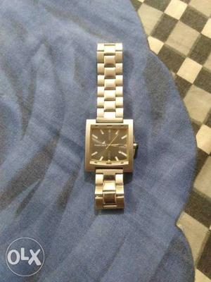 Silver color fastrack original wrist watch.