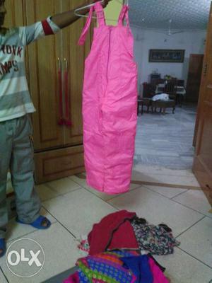 Snow pants,pink in color aged 4 to 7 years