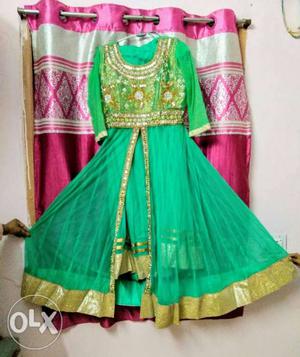 This green lush dress is in more than  rupees