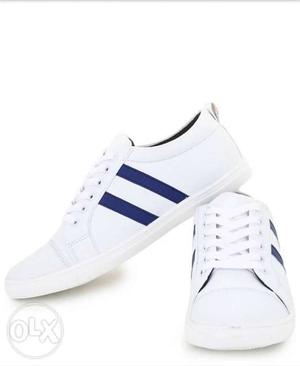 Unpaired White And Blue Adidas Superstar