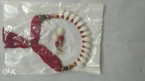 White And Red Beaded Bracelet
