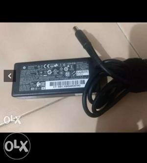Black And Gray HP laptop charger Compaq b urgently sale