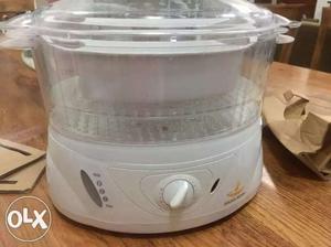 Branded corn and vegetable electric steamer in