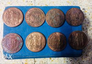 Eight Round Copper-colored Coin Lot
