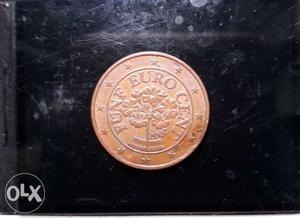 It is a England gold coluored coin