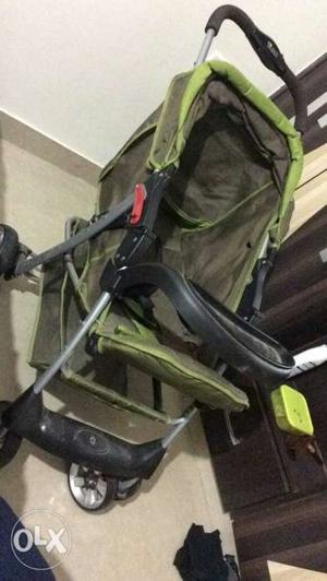 Baby's Green And Black Stroller from Mom and me