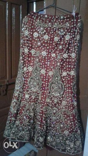 Copper red fully embroidered lehnga