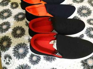 Pair Of Black-and-red Slip On Shoes