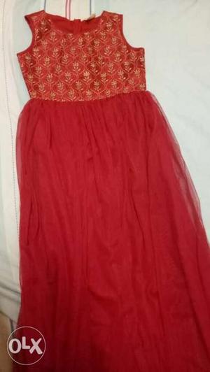 Partywear Red gown silk and netted gown with