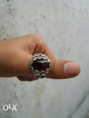 Pure silver ring with dark red stone
