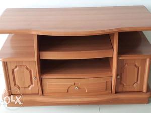 TV unit made with mdf and melamine finish. Good