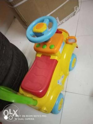 Toddler's Yellow And Red Ride On Toy