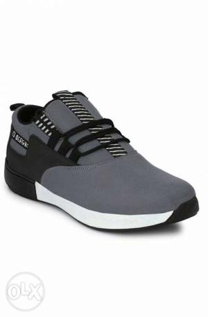 Unpaired Black And Gray Adidas NMD