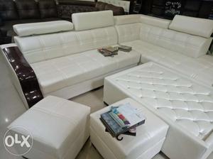 White geat style L shape sofa with 8 years