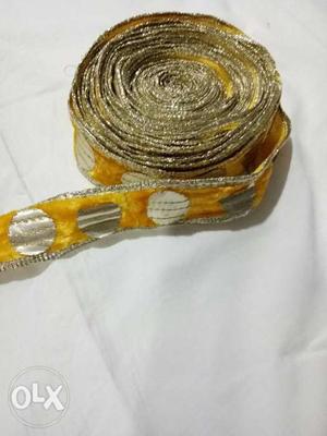 Yellow And Gold Textile