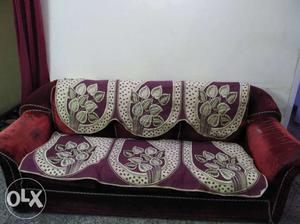 5 seater Velvet maroon Sofa with golden strip