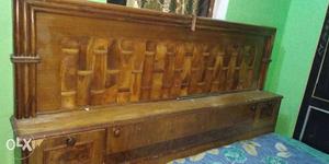 A Very Heavy and Hard Material Double bed in a