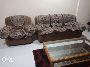 A gud quality 5 seatr Sofa wid Tea table available at